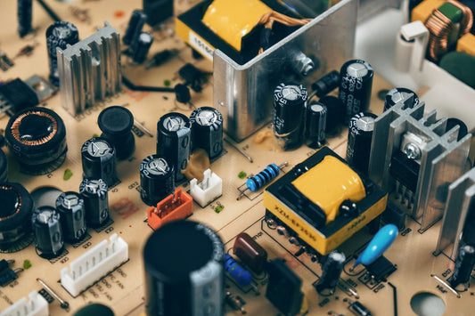 Close-up of a green circuit board with electronic components, representing the Raspberry Pi technology behind PiPedal guitar effects