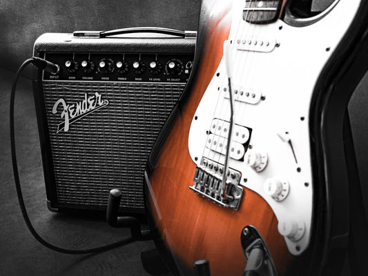 Black Fender guitar amplifier close-up representing clean guitar tones