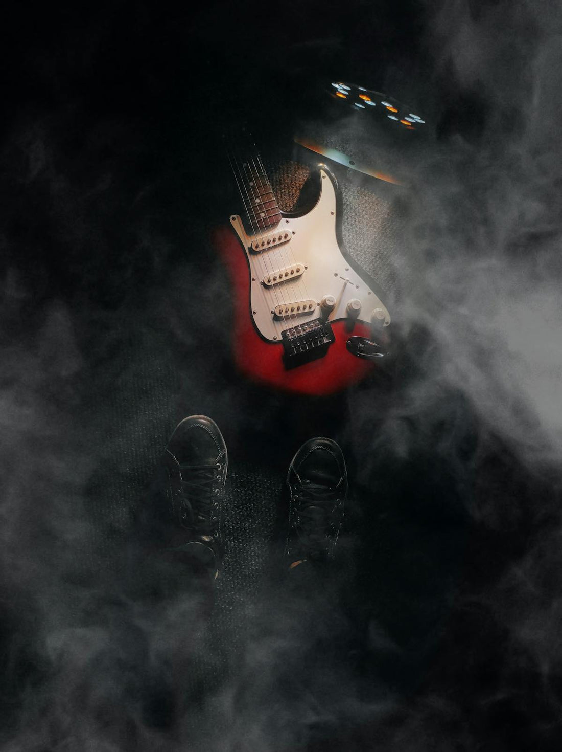 Close-up of an electric guitar being played, representing the modern digital tone experience with TONEX preset sharing